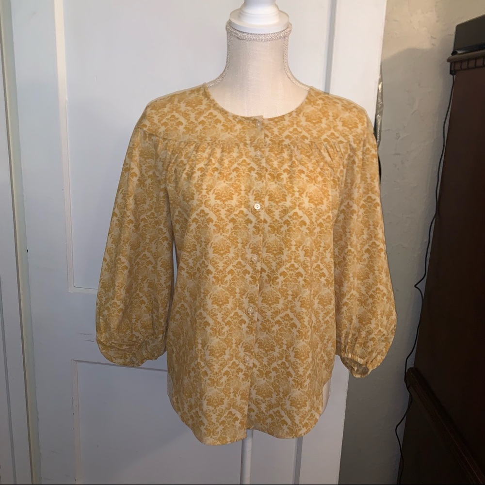 Women’s medium petite blouse gold design by Loft great condition
